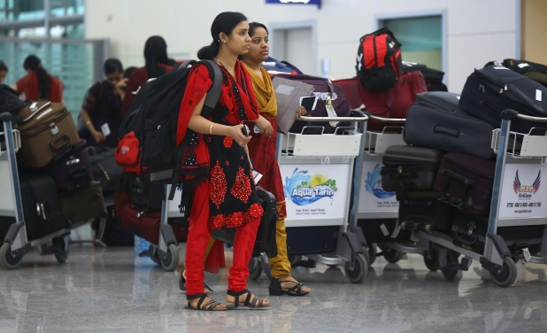 Indian nurses who were trapped in territory captured by Islamic militants wait for the plane to begin their journey home at Irbil International Airport, Iraq (Photo: AP) Indian nurses who were trapped in territory captured by Islamic militants wait for the plane to begin their journey home at Irbil International Airport, Iraq (Photo: AP)